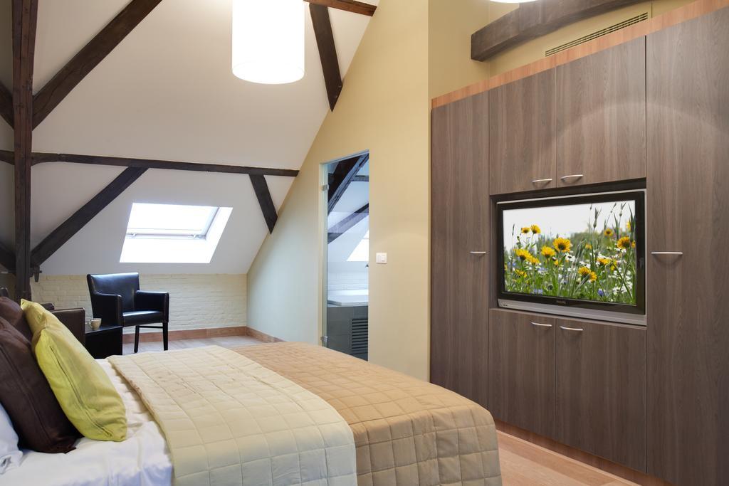 Hotel Het Godshuis Sint-Laureins Pokoj fotografie